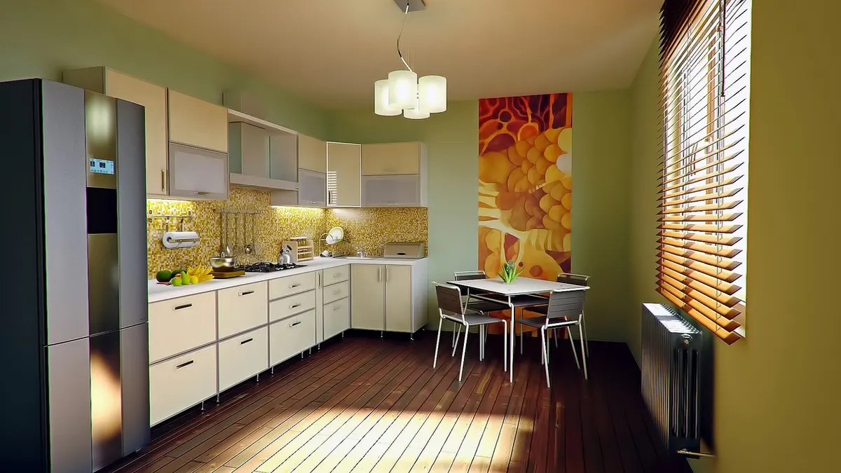 Cozinha iluminada com geladeira inox e mesa de jantar